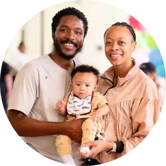 couple holding a baby